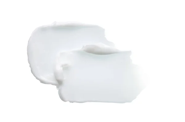 白を基調としたホワイトの質感とフェイスクリームやホワイトのアクリル塗料のスミア — ストック写真