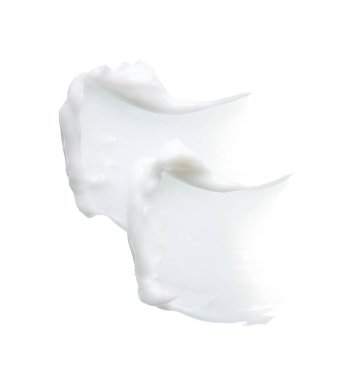 Beyaz desen ve yüz kremi lekesi veya beyaz arkaplanda izole edilmiş beyaz akrilik boya