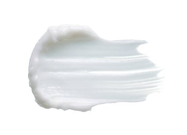 Beyaz desen ve yüz kremi lekesi veya beyaz arkaplanda izole edilmiş beyaz akrilik boya