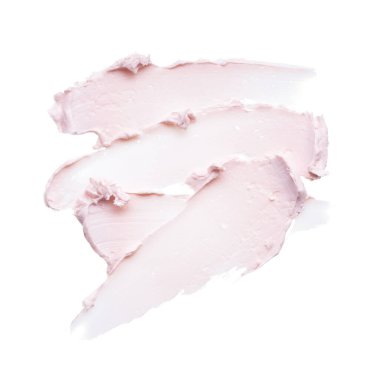 Nazikçe pembe fırça darbeleri ve yüz kremi dokusu veya beyaz arka planda pembe akrilik boya