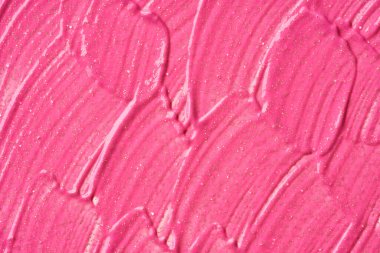 Beyaz arka planda parıltıları olan çok renkli akrilik boya dokusu ve vuruşları