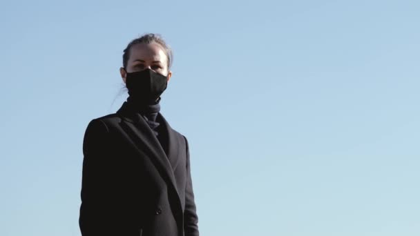 Girl Black Protective Mask Takes Takes Deep Breath Exhales Smile — Stock Video