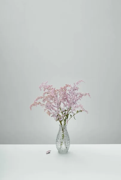 Delicate Pink Flowers Glass Vase Blue Background — Stok Foto