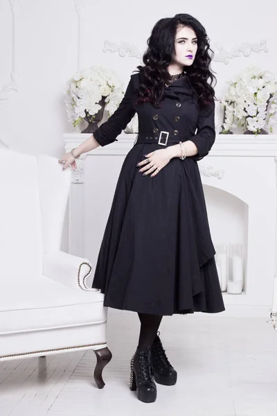 Sensual gothic woman in a long gorgeous black dress — Stock Photo, Image