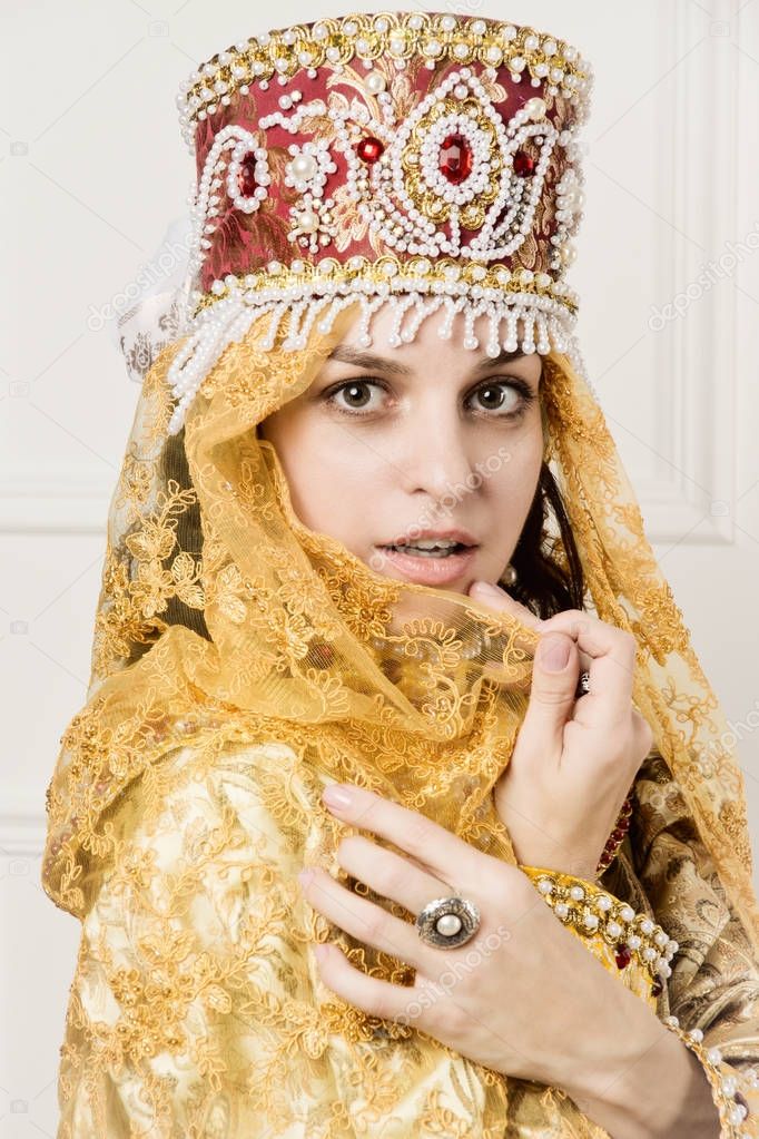 Russian queen in historical dress suit 