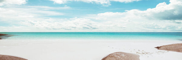 Tropical sea and cloudy sky