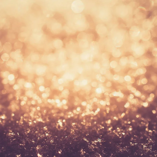 Kar bokeh donmuş altın Parlatıcı ışıklar — Stok fotoğraf