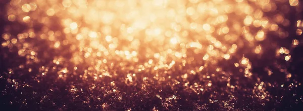 Gold Glanz Lichter gefrorenen Schnee Bokeh — Stockfoto