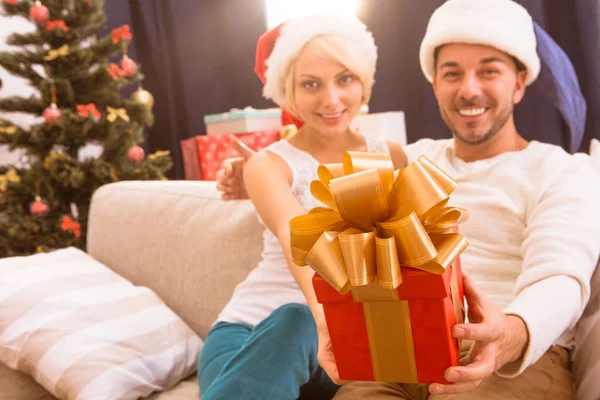 Happy Christmas couple celebrating New Year — Stock Photo, Image