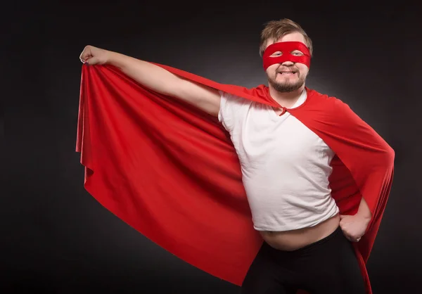 Junger Superheldenmann im Studio — Stockfoto