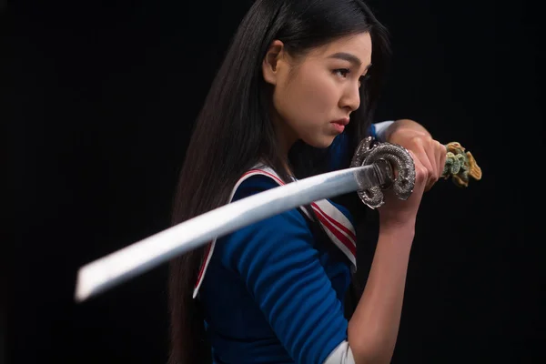 Asian lady with sword in studio — Stock Photo, Image