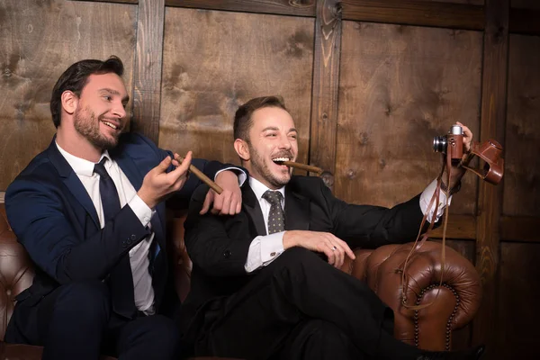 Rich businessmen with cigars — Stock Photo, Image