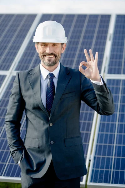 Solar panel energy choice of businessman. — Stock Photo, Image