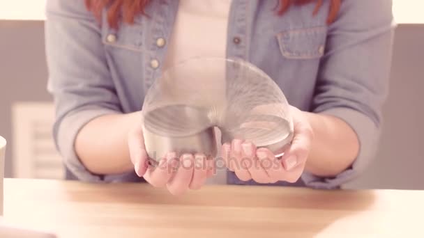 Close up view of woman s hands with slinky. — Stock Video