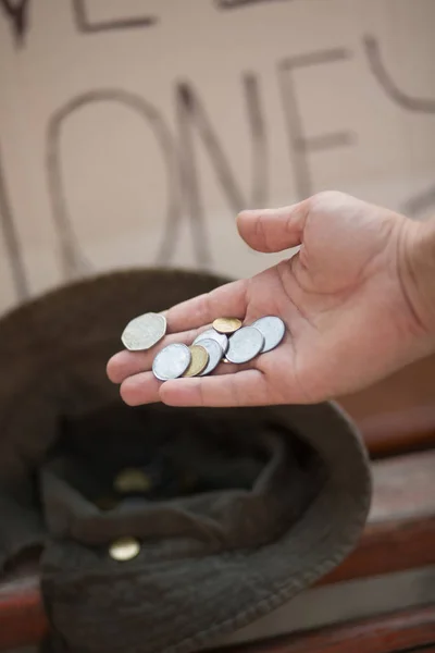 Close up view of hand with coins. — Stock Photo, Image