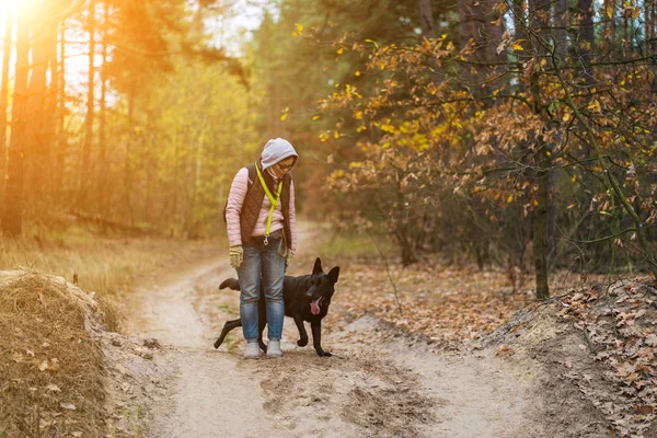 The Woman Standing On The Road In The Forest — Stok Foto