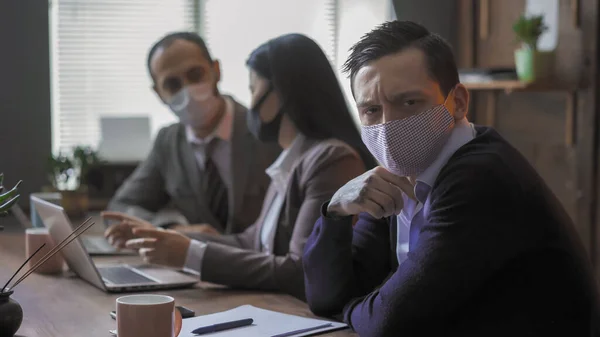 Office Workers In Protective Mask Works During Quarantine