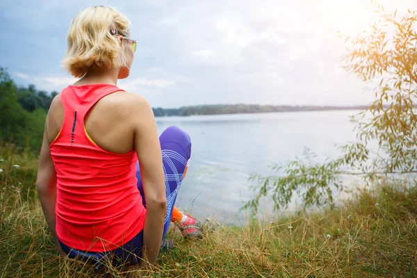 Girl on lake in forest — Stock Photo, Image