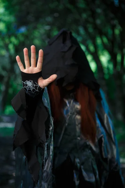 Photo of witch in hood — Stock Photo, Image