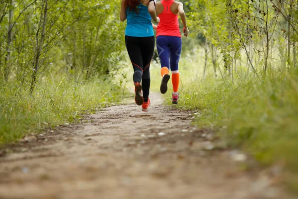 Two running athletes in park — Stock Photo, Image