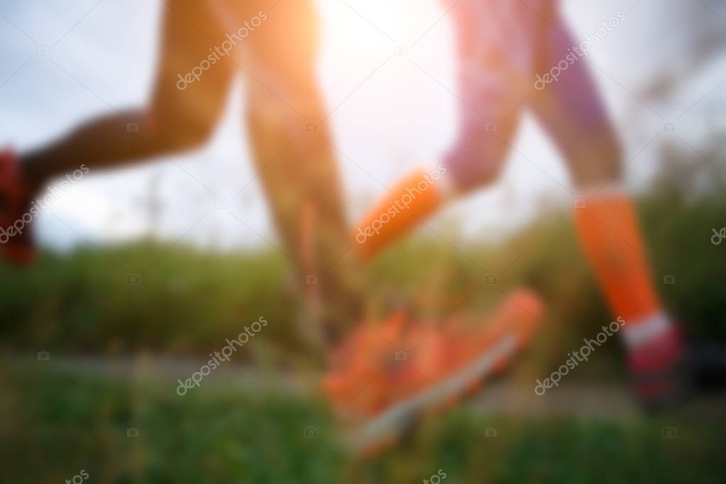 Two running women in forest