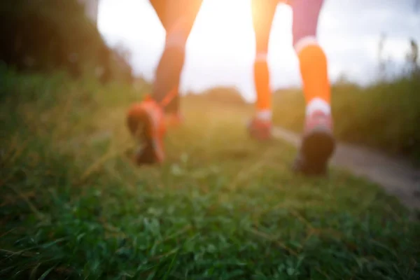 Blurred picture of running girls — Stock Photo, Image