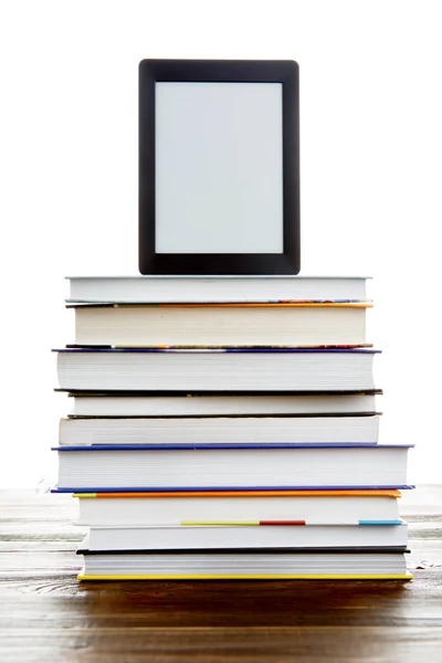 Black picture frame on stack of books — Stock Photo, Image