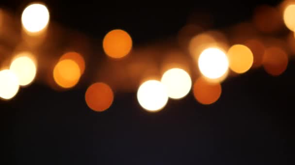 Abstrato embaçado luzes de Natal Bokeh fundo. Filmagem 4K — Vídeo de Stock