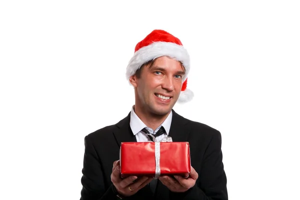 Porträt des glücklichen Kerls im Business-Anzug, Weihnachtsmann-Mütze — Stockfoto