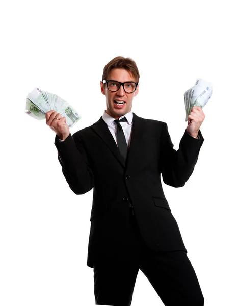 Foto de hombre de negocios en traje con dinero en las manos —  Fotos de Stock