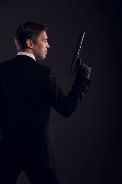Deri eldiven silahlı gangster adam arka resim
