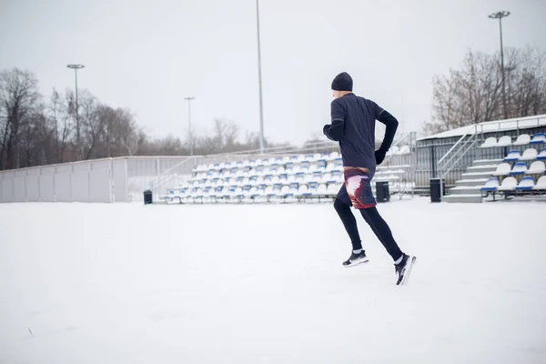 Image of running athlete through stadium — Stock Photo, Image