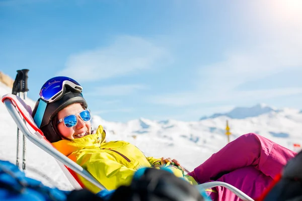 Picture of smiling sports woman lying on deckchair — Stock Photo, Image
