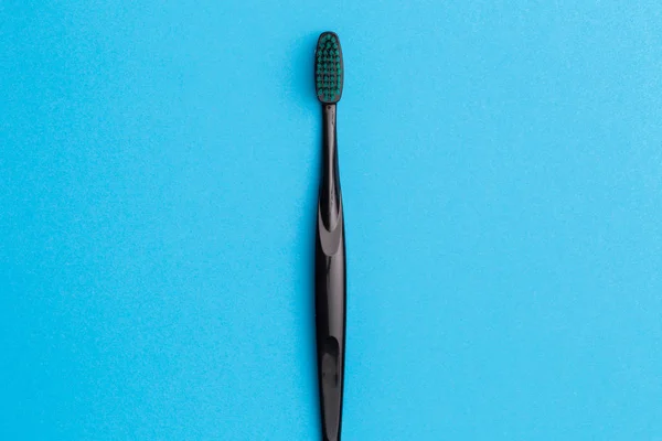 Obrázek z jednoho černého zubní kartáček — Stock fotografie