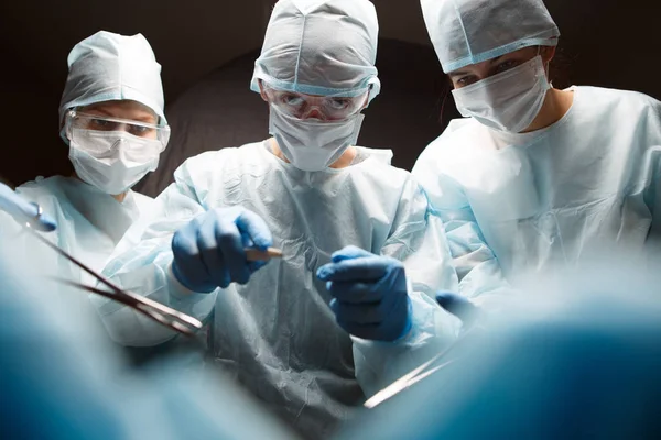 Photo of surgeons with instruments — Stock Photo, Image