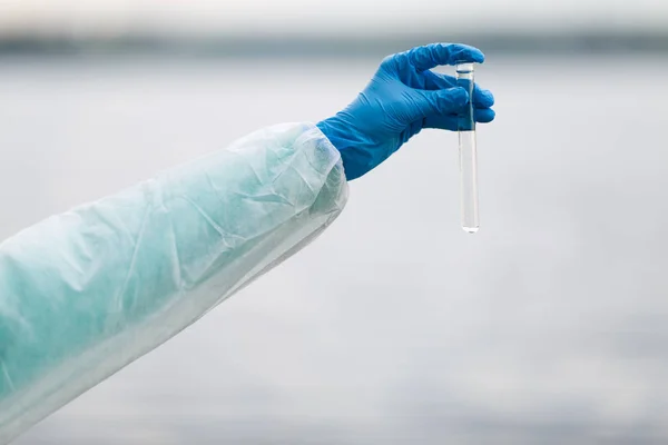 Photo of hand with test-tube — Stock Photo, Image