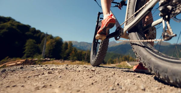 Bottom picture of woman on bicycle — Stock Photo, Image