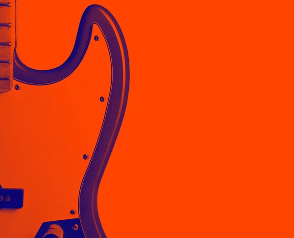 Part of guitar on empty red background, close-up — Stock Photo, Image