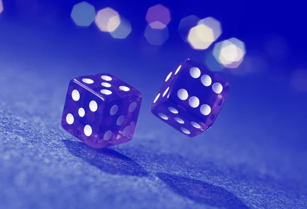 Two dice on blue background. — Stock Photo, Image