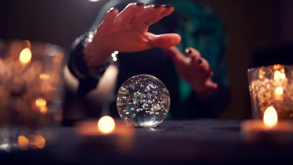 Close-up of woman fortune-tellers hands with ball of predictions — Stock Photo, Image