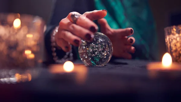 Fortuneteller womans hands with predictions ball — Stock Photo, Image