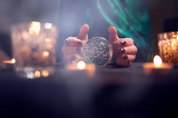 Close-up of fortuneteller womans hands with predictions ball — Stock Photo, Image