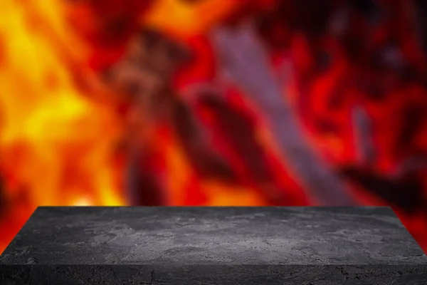 Каменная поверхность на фоне красного пламени, крупным пламенем . — стоковое фото
