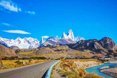 road leading to majestic Mount Fitz Roy clipart