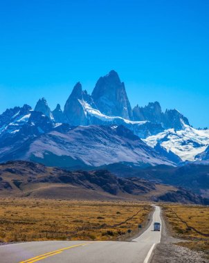 car on highway leading to Fitz Roy clipart