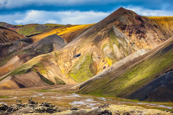 Multi-colored mountains from mineral rhyolite Stock Photo