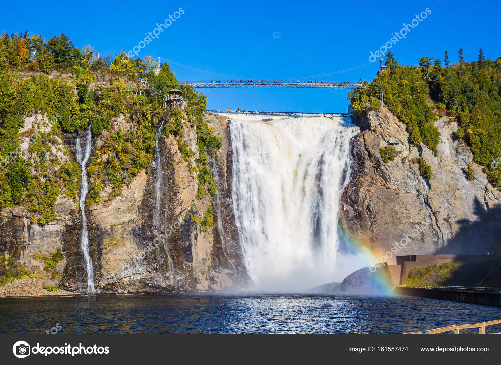 Magnificent Rainbow Plays In Fallssplashes Stock Photo - 