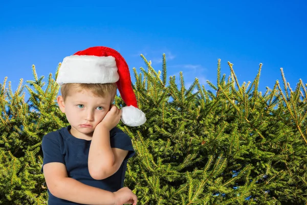 Jongen in rode dop van de Kerstman — Stockfoto