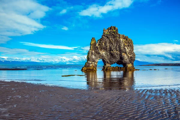 Magic Rock Hvitsercur at sunset. Soft northern sun of Iceland. Concept of northern extreme tourism.