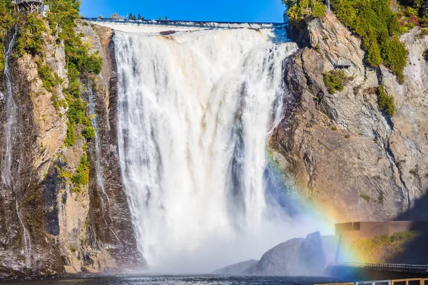 stock image Magnificent waterfall in Montmorency Falls Park. The concept of active and cultural tourism